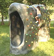 natural playgrounds boulder with slide